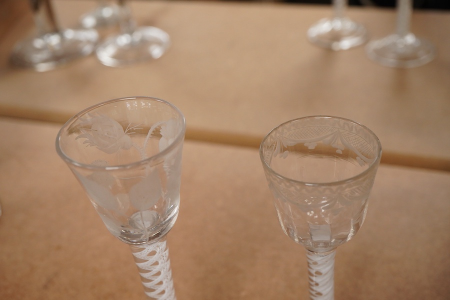 Two 18th century DSOT cordial glasses, one bowl engraved with roses, the other with swag decoration, tallest 16.5cm